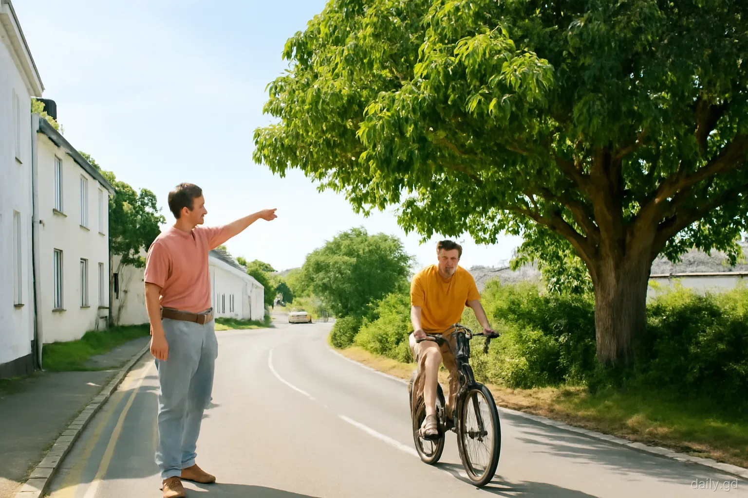 A man on a quiet village road in St David's pointing uphill past a large mango tree while a newcomer on a bicycle follows his gesture, wide shot, morning light